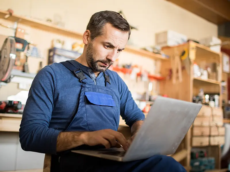 business owner on laptop