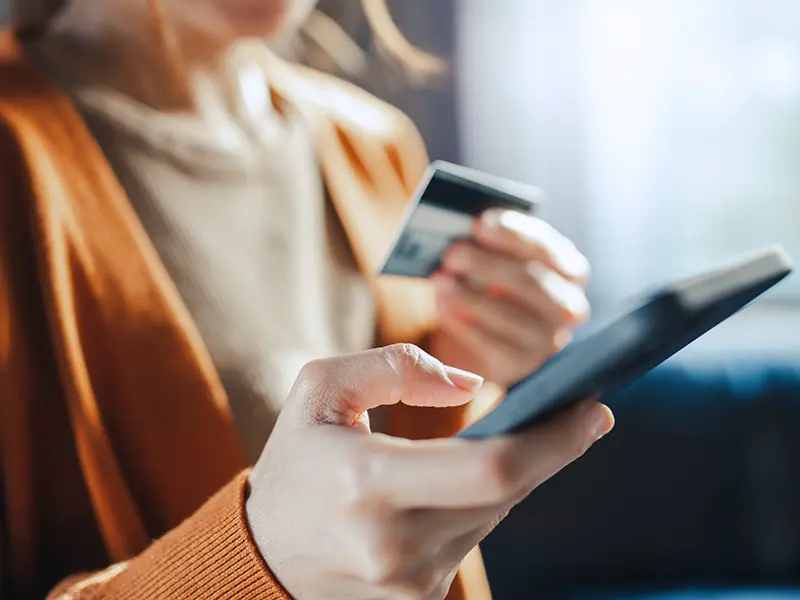 woman holding card