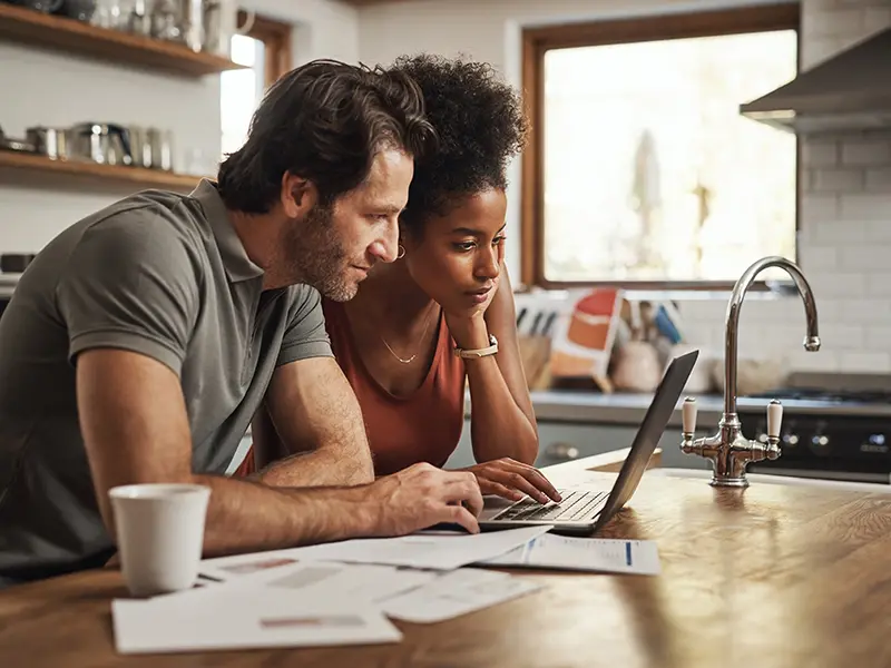 couple looking at laptop